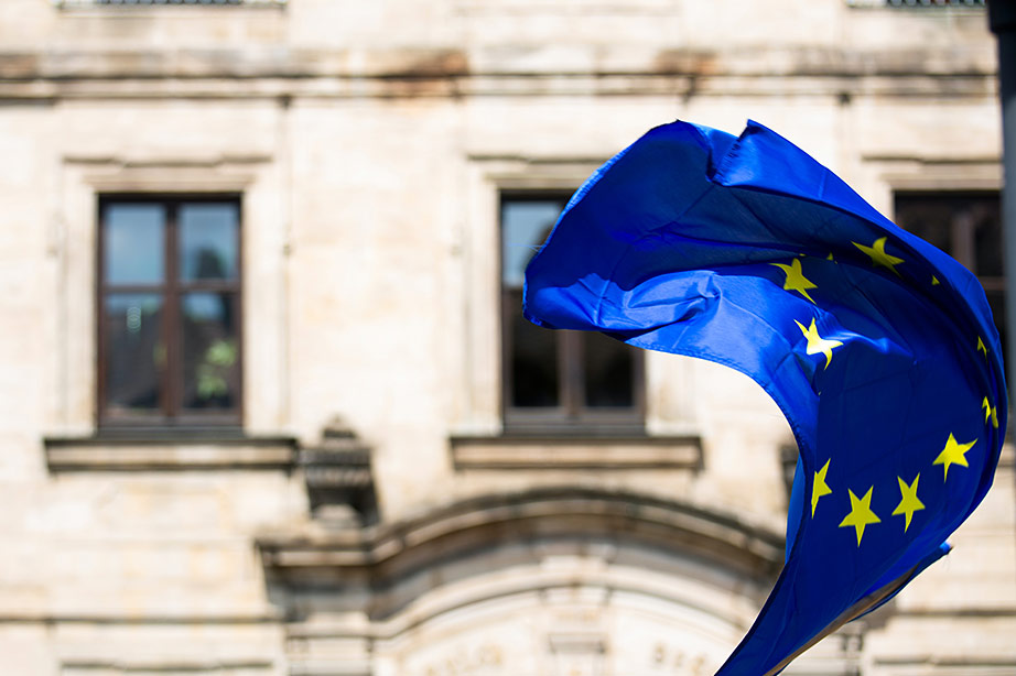 A European flag blows away in London