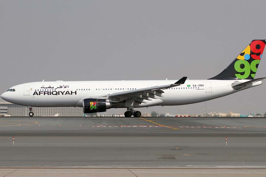 Afriqiyah Airways airplane on runway