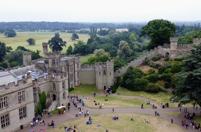Castle in Warwickshire England visited by tourists sightseeing.