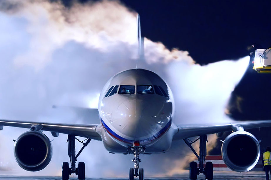 de-icing of a plane on the runway