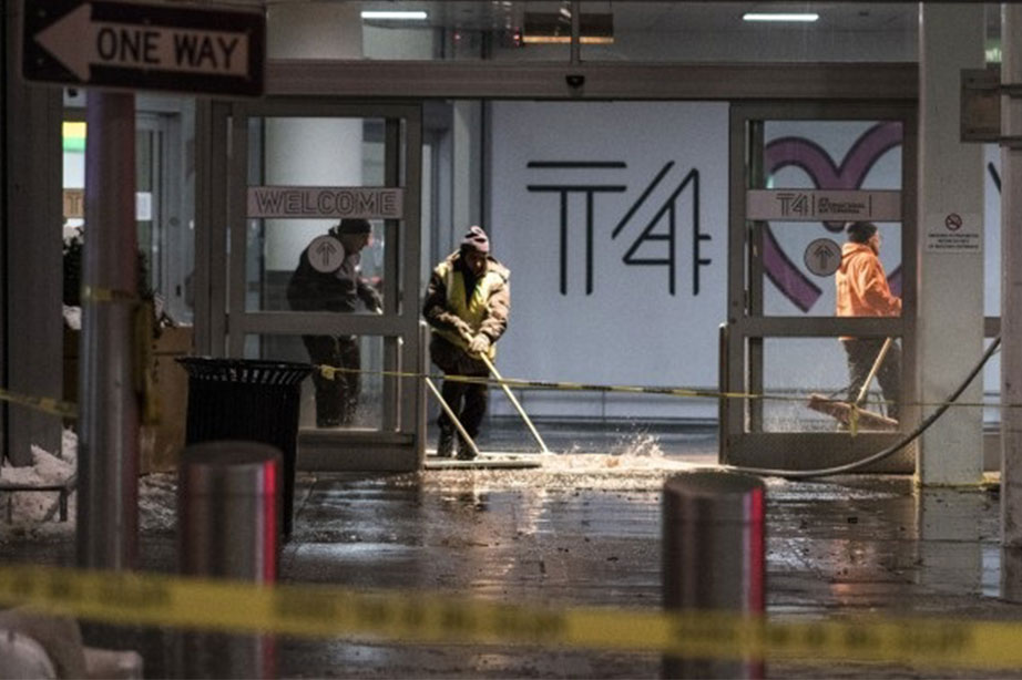 Airport workers at JFK are trying to get rid of water