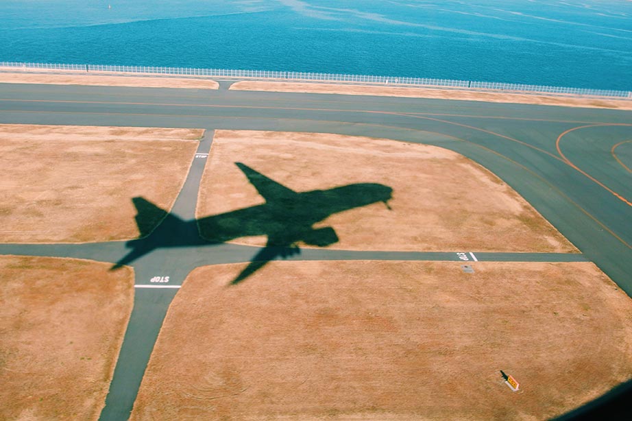 shadow of plane on land