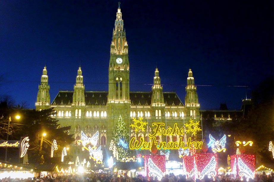 Christmas market in Vienna with lights on during night