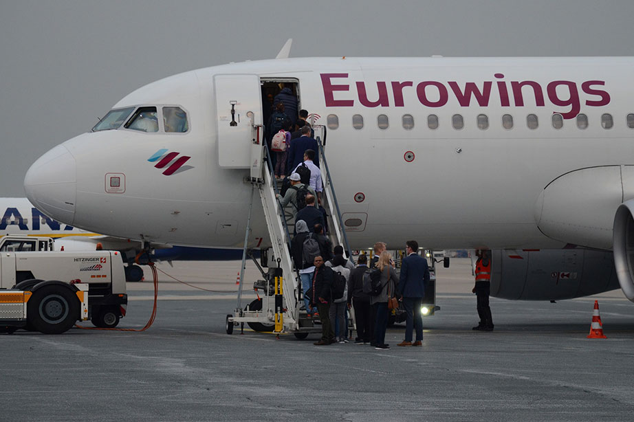 Eurowings airplane parked while passengers embark te plane