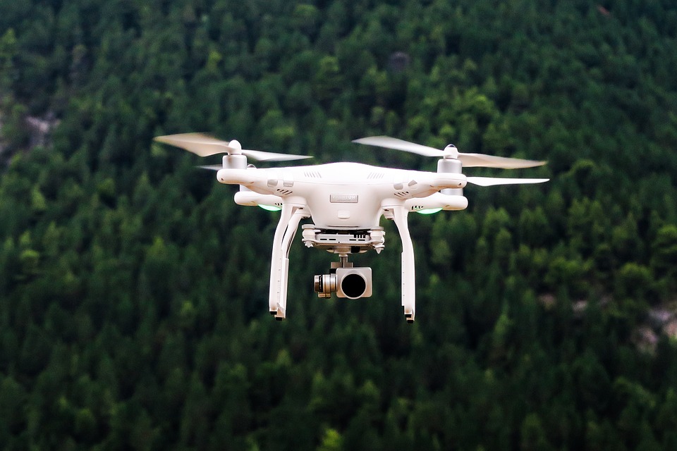 Drone flying over forest