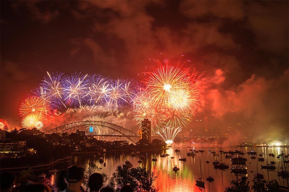 Fireworks over the opera house at the Sydney Harbour