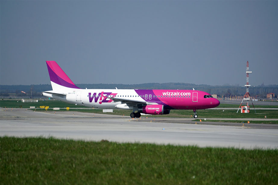 wizz air plane on runway