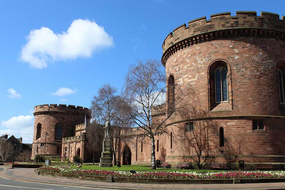 old castle in carlisle cumbria with a blue sky