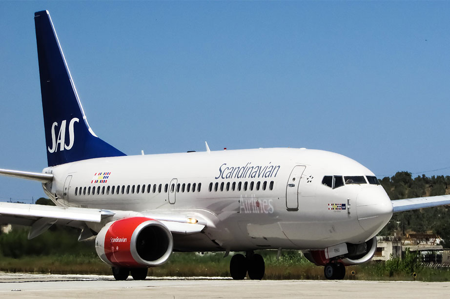 scandinavian airlines plane on runway