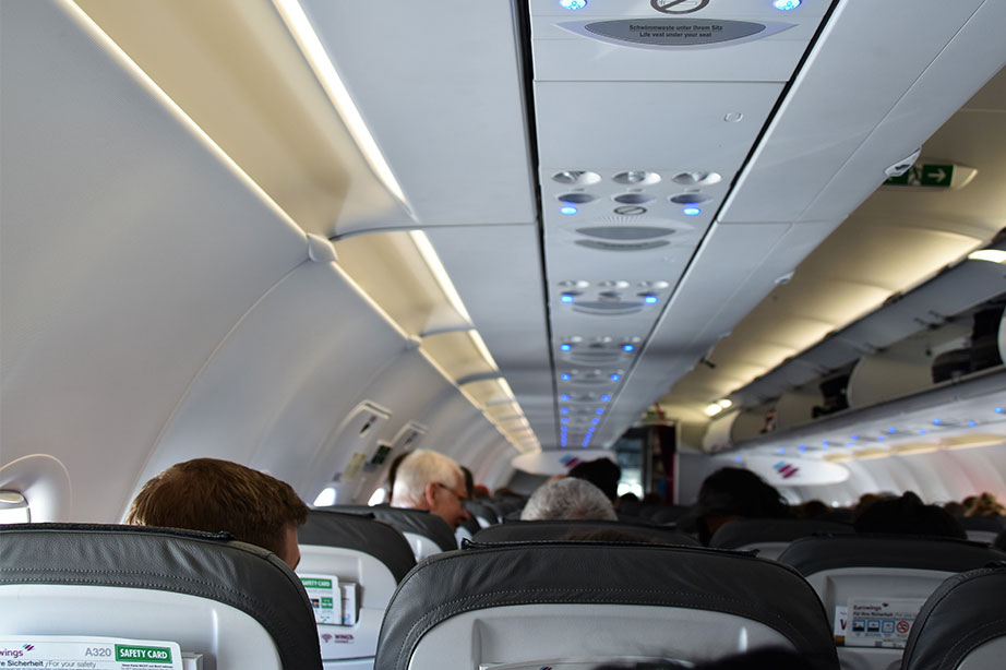 passengers in plane cabin