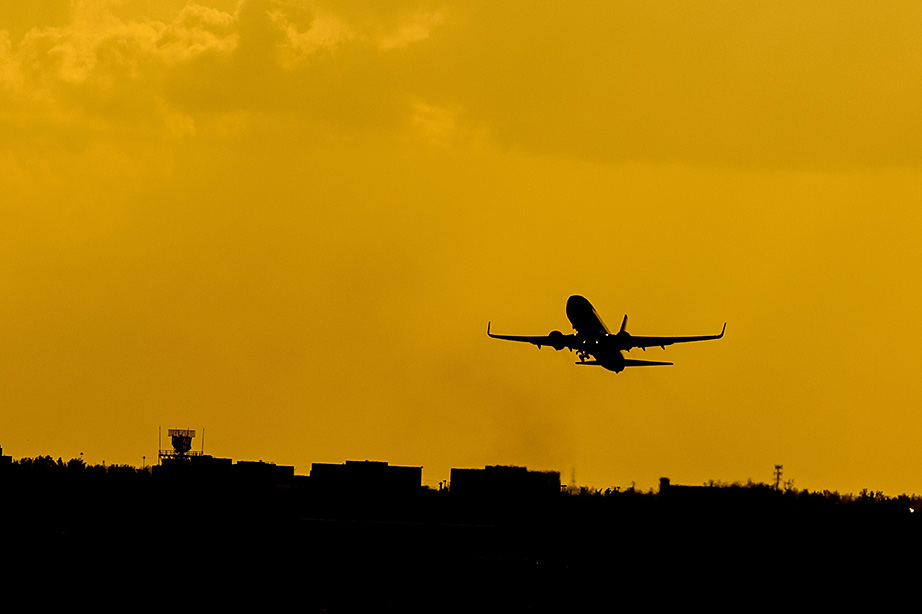 airplane by sunset