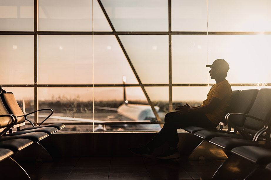 passenger waiting in gate for his flight