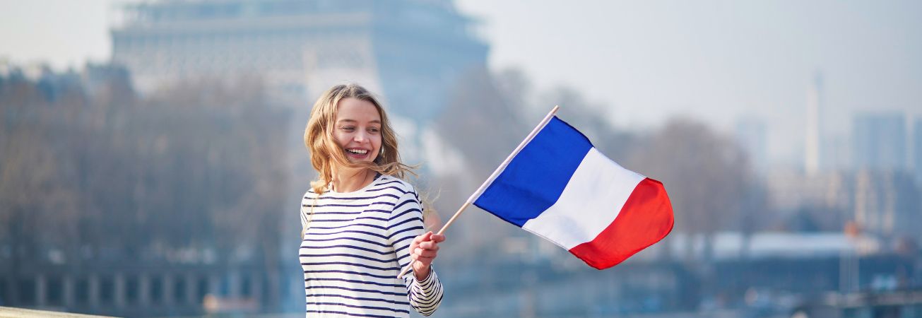 Girl waving French flag during strike